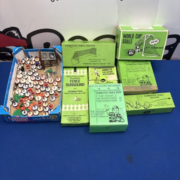 Vintage Subbuteo football collection with players and boxed sets.
