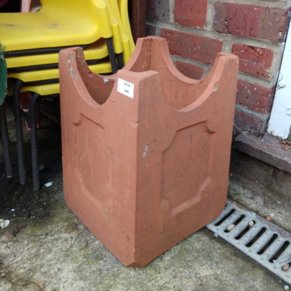 Vintage terracotta chimney pot for garden or architectural use.