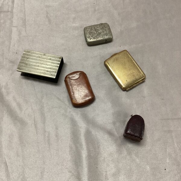 Vintage lot of vesta cases and matchbox holders, antique smoking accessories.