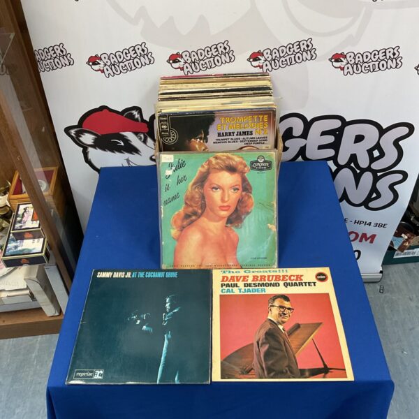 Vintage vinyl record lot from the 1960s, collectible music.
