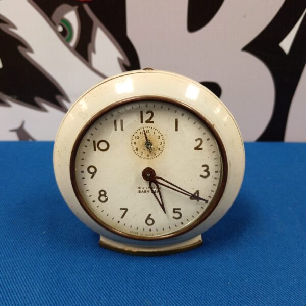 Vintage Westclox Baby Ben alarm clock with cream case.