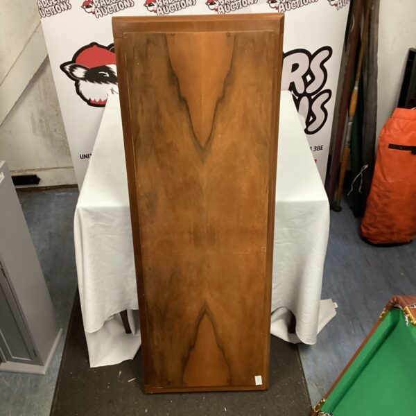 Vintage wooden headboard with extension pieces, classic bedroom furniture.