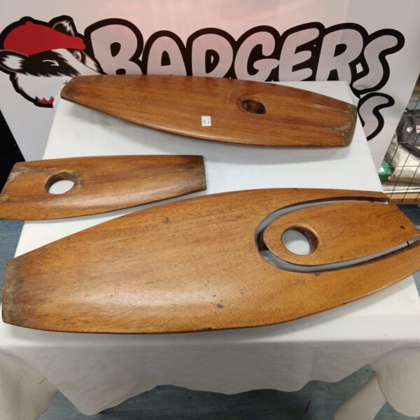 Vintage wooden aircraft propeller repurposed as unique wall art.