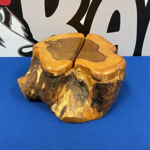 Front view of vintage yew wood trinket box with two compartments.