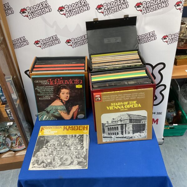 Vintage vinyl record collection in a case, classical music.