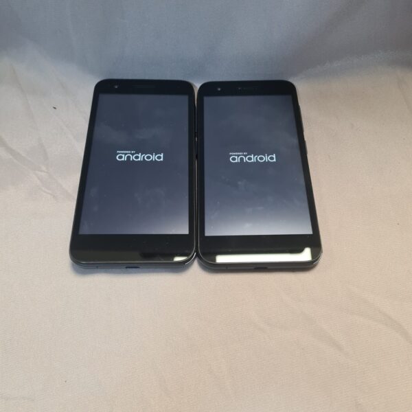Two used Vodafone Smart E8 smartphones presented as a lot.