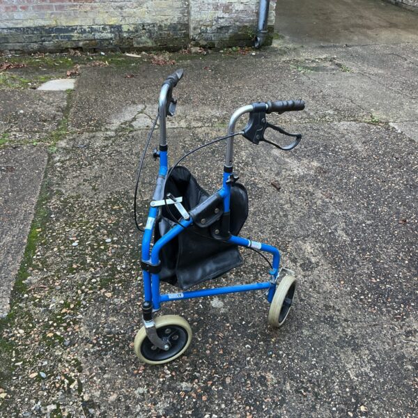 Front view of a blue walking aid trolley with a wire basket.