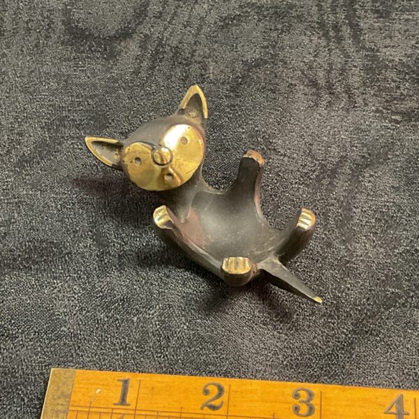 Vintage brass Walter Bosse cat egg holder, mid century modern design.