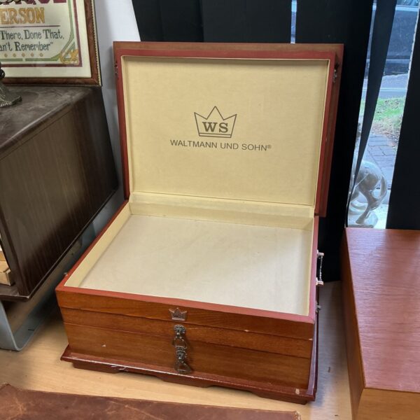 Vintage Waltmann und Sohn wooden cutlery box with drawers open.