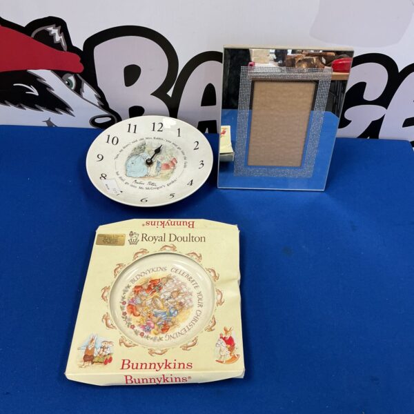 Vintage Wedgewood Peter Rabbit clock with Royal Doulton Bunnykins plate.