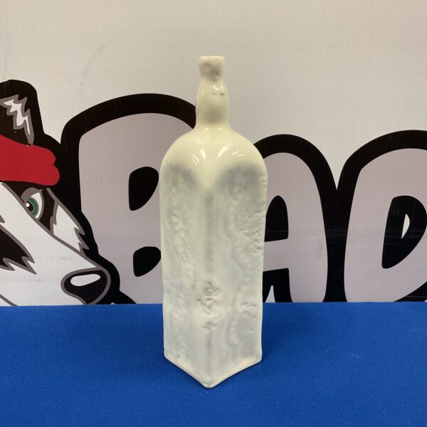 White ceramic bottle vase with a signed base, decorative art piece.