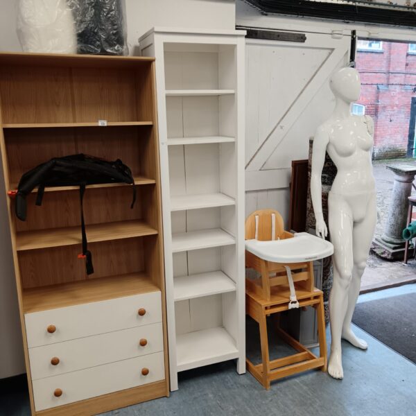 White display cabinet with drawers and open shelving.