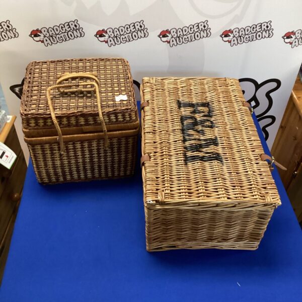 Pair of vintage wicker baskets, ideal for storage or picnics.