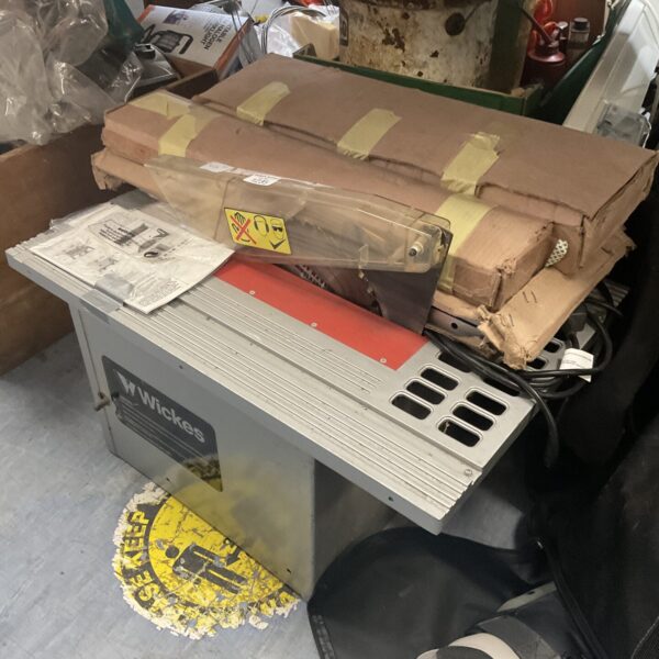 Used Wickes table saw with stand, ideal for DIY projects.