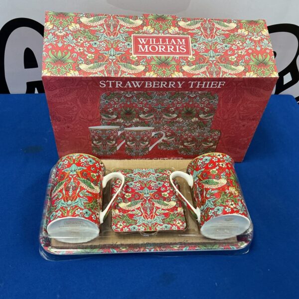 William Morris Strawberry Thief tea cup set with floral design.