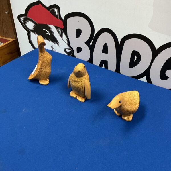 Lot of three vintage wooden bird ornaments for home decor.