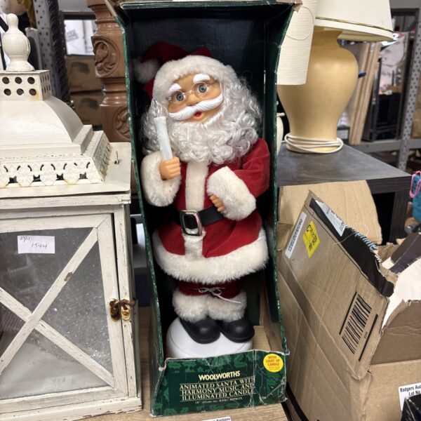 Vintage Woolworths animated Santa with illuminated candle and music.