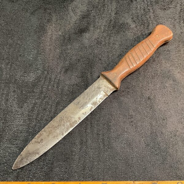 WWI German trench knife recovered from the Somme battlefield, a historical relic.