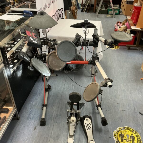 Used Yamaha electronic drum kit for music production and practice.