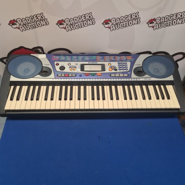 Vintage Yamaha PSR-260 electric keyboard with keys and controls.
