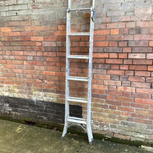 Vintage Youngman combination ladder in used condition.