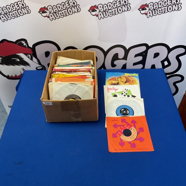 Vintage 45 records lot for collectors and music enthusiasts.
