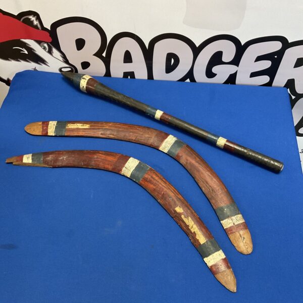 Antique Aboriginal boomerang and war club, traditional Australian artifact.