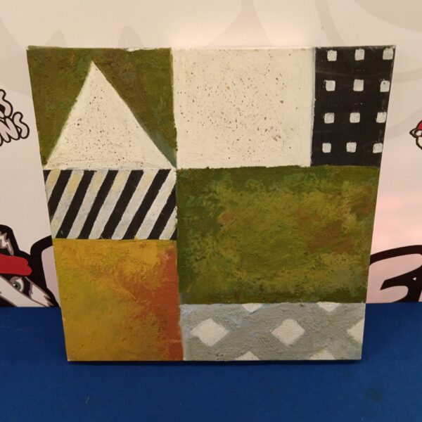 Colourful abstract canvas art with geometric shapes.