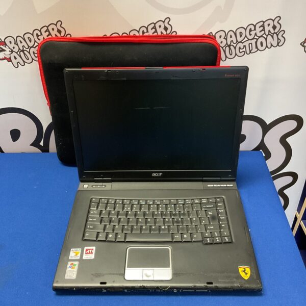 Vintage Acer Ferrari laptop with AMD processor and ATI graphics.