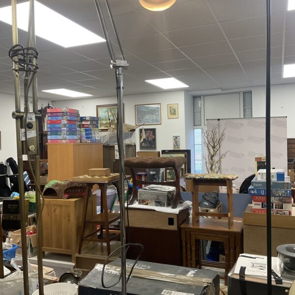 Vintage adjustable metal lamp with industrial design.