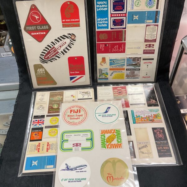 Vintage airline and hotel ephemera collection, including matchbooks and tickets.