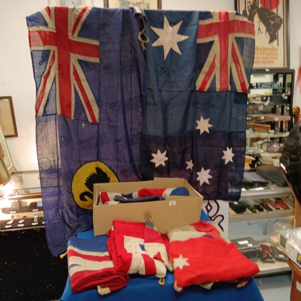Antique panel stitched British and Australian flags from WW1 and WW2 eras.