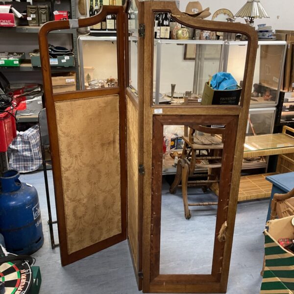Antique mahogany privacy screen with intricate carving, requiring restoration.