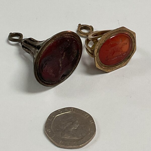 Antique pinchbeck fob seal with engraved design, Victorian era.