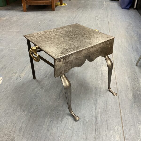 Antique steel range trivet with brass handles, Victorian or Georgian era.