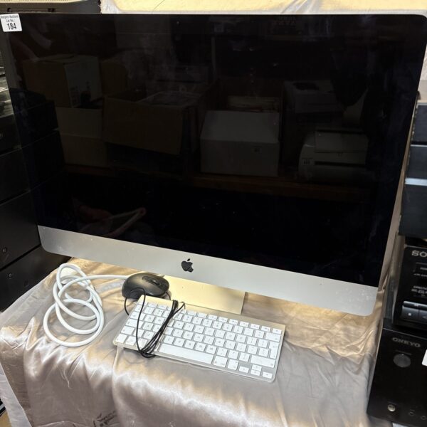 Apple iMac A1419 all-in-one desktop computer with keyboard and mouse.