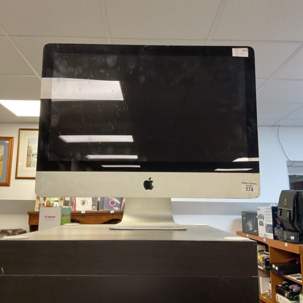 Vintage Apple iMac monitor, classic desktop computer display.