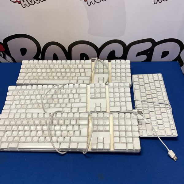 Lot of four Apple Mac keyboards presented as-found.