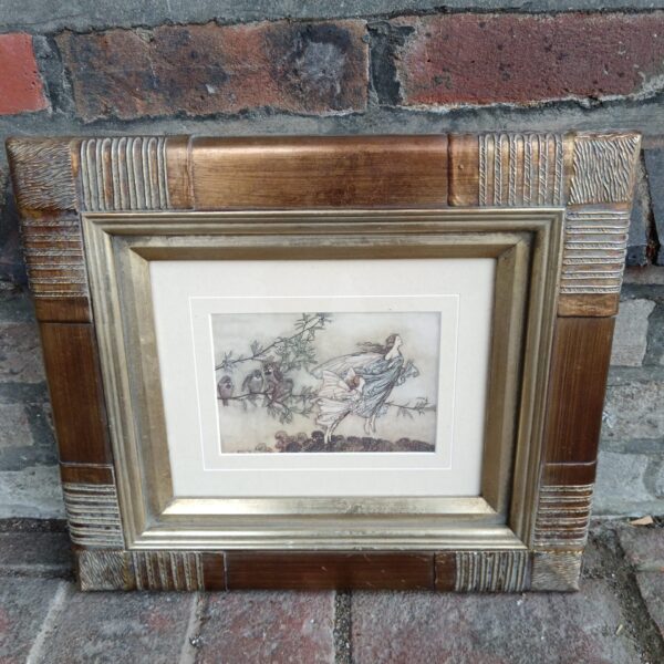 Antique Arthur Rackham print depicting fairies and birds in a whimsical scene.