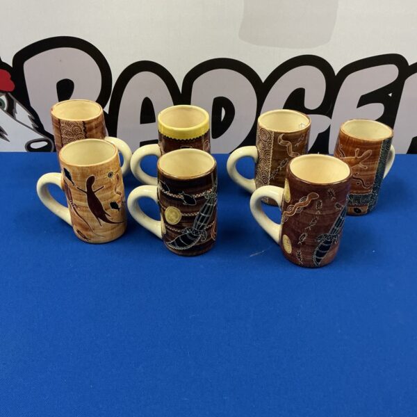Set of four Australian art inspired ceramic mugs.