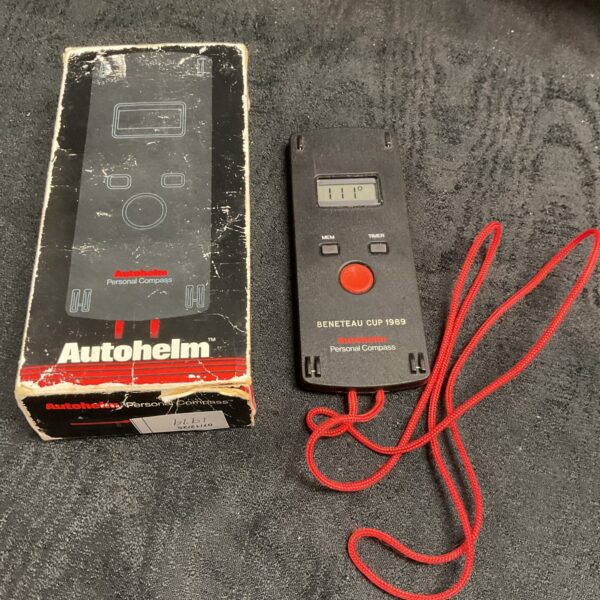 Front view of a vintage Autohelm personal digital compass.