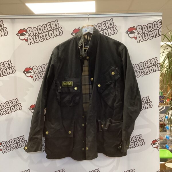 Classic Barbour wax jacket in good condition, front view.