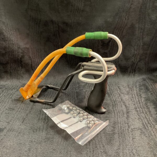 Vintage Barnet slingshot with included metal shot ammo.