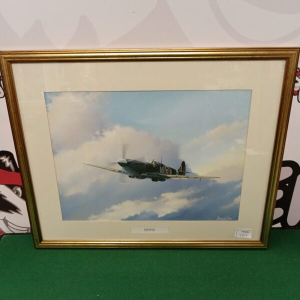 Framed Barry G Price print of a Spitfire Mark IX aircraft in flight.