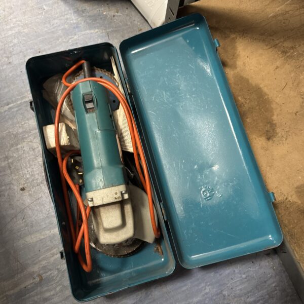 Vintage Black & Decker angle grinder in its original carrying case.