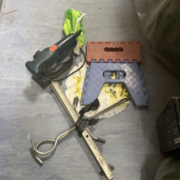 Black & Decker electric sander with folding stool and roof ladder rack.