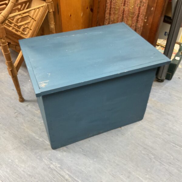 Blue painted pine trunk for storage and farmhouse decor.