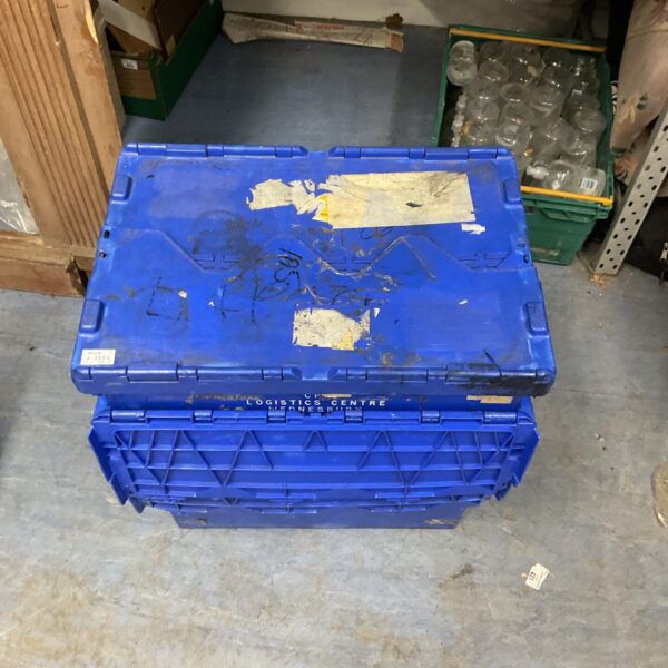 Stack of four blue plastic storage crates for utility and organisation.