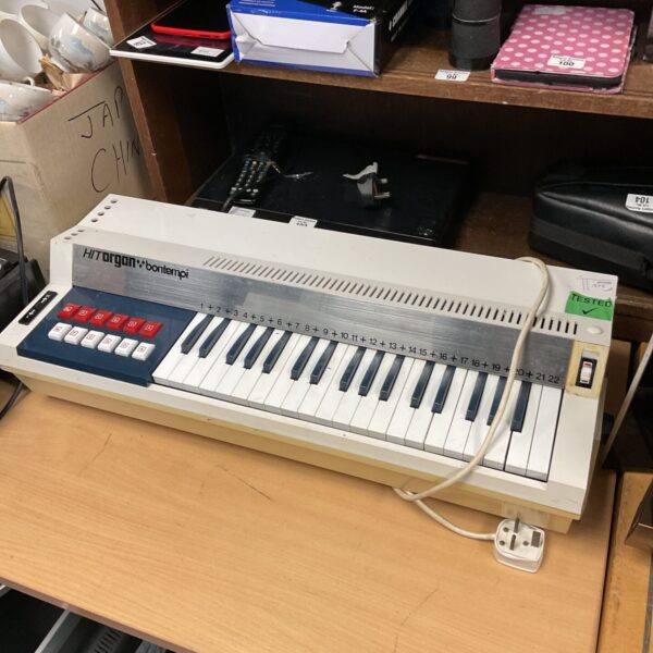 Vintage Bontempi Hit Organ keyboard with keys and controls.