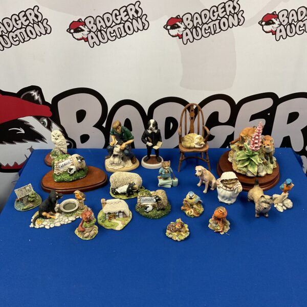 Collection of Border Fine Arts and Beswick animal ornaments for collectors.
